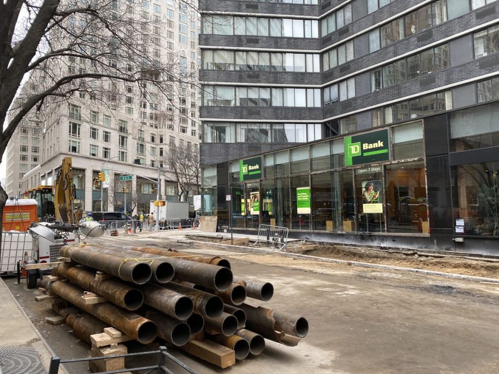 pipes wait to be installed on 62nd Street near TD Bank