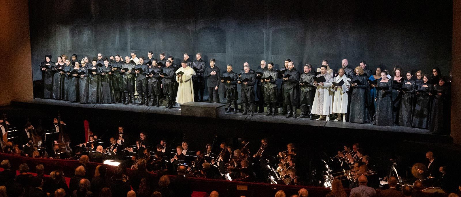performers at the met sing on stage together