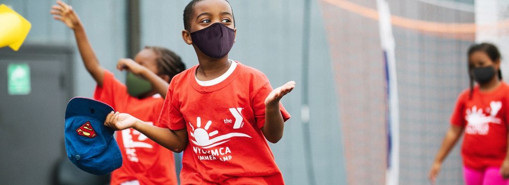 kid wearing mask at ymca camp
