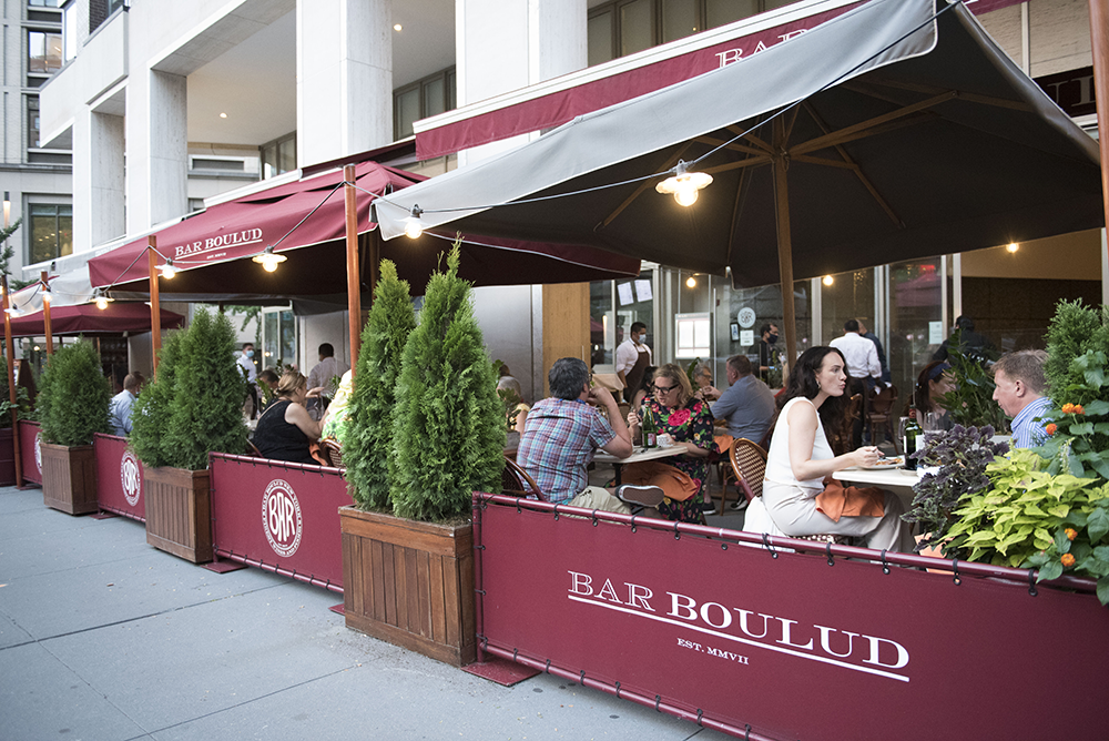 diners eating outside bar boulud
