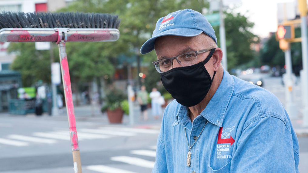 Close up of clean Team Member Carl wearing a black face mask