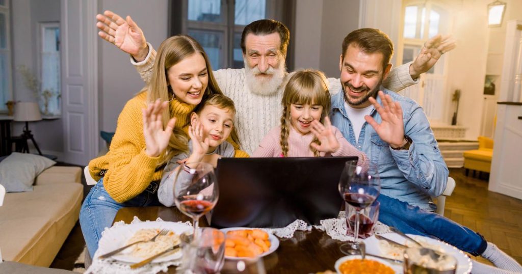 family centered around a computer