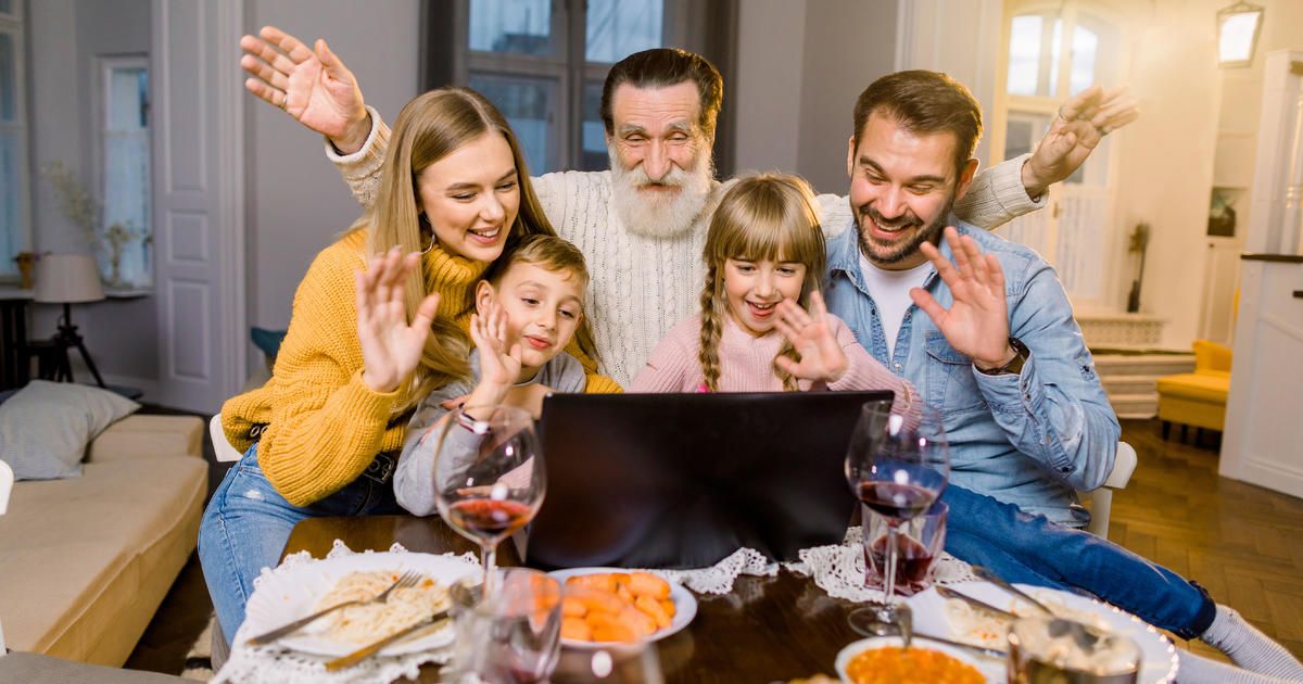 family centered around a computer