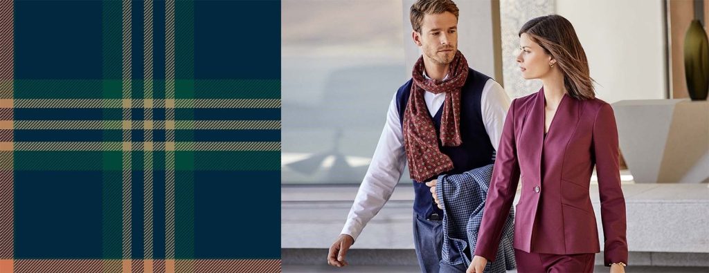 man and woman in Brooks Brothers clothing pose for an ad for fall