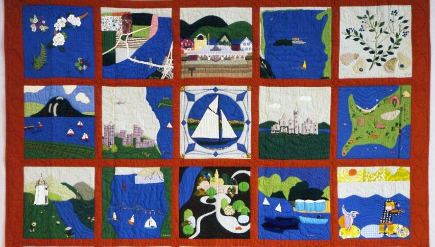 a quilt with mostly blue