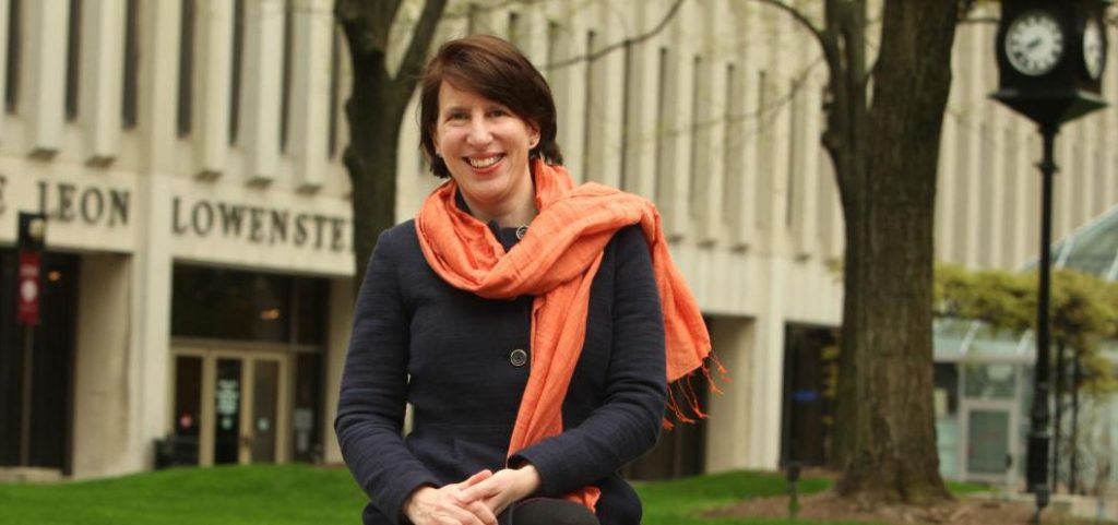 Laura Auricchio poses in front of Fordham's Lincoln Center campus
