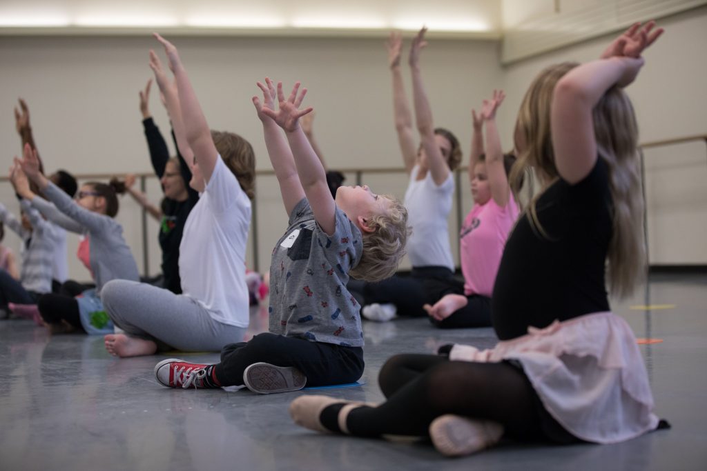 children in a performing arts class