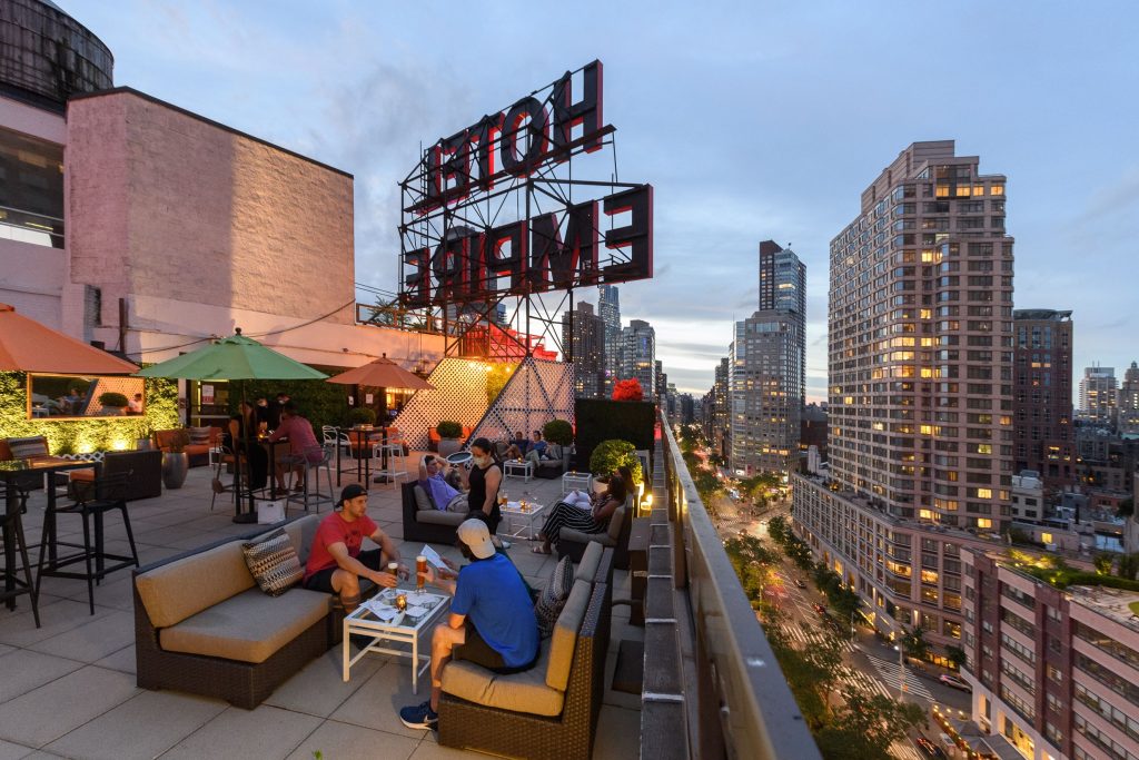 people dining on the empire rooftop