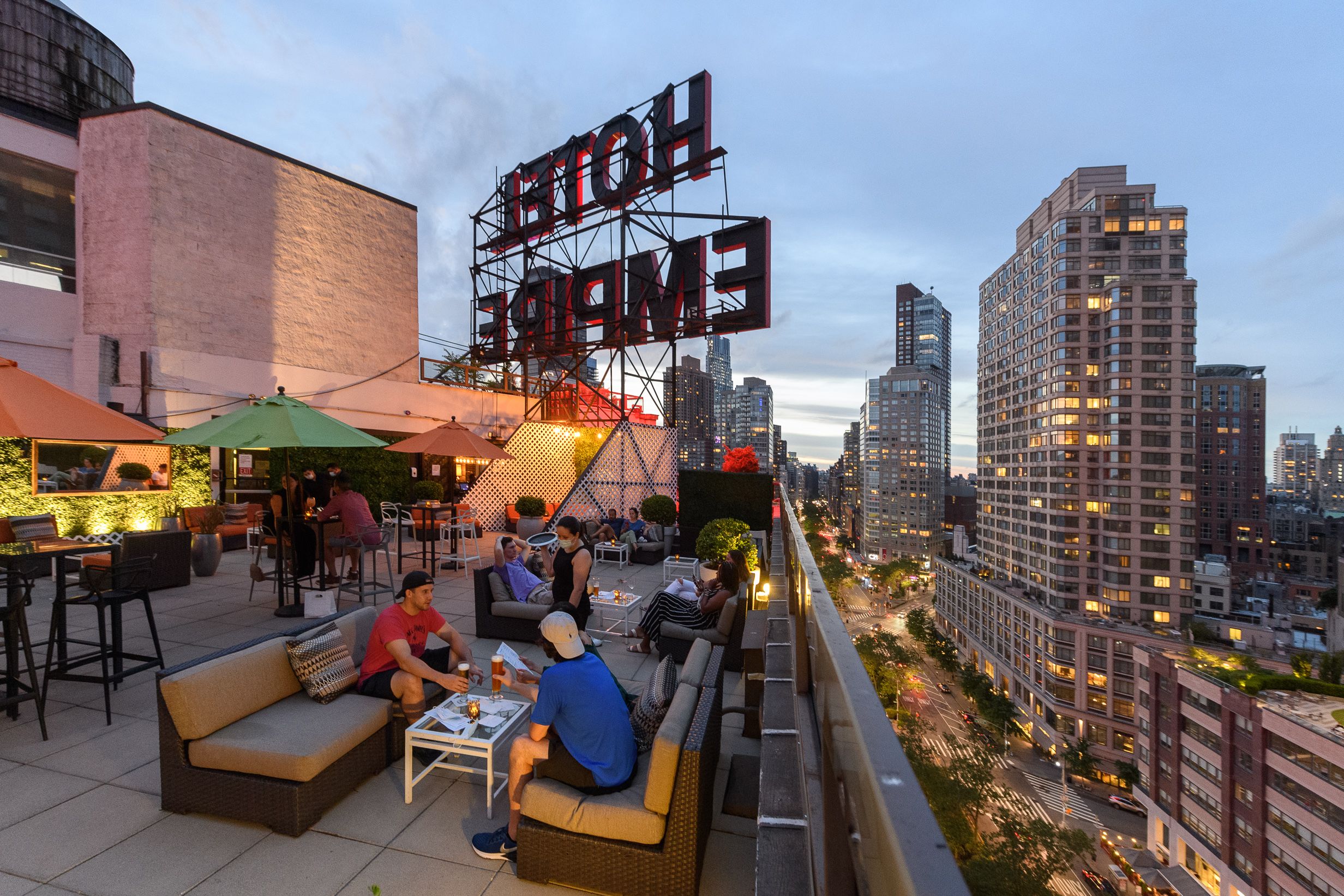 people dining on the empire rooftop