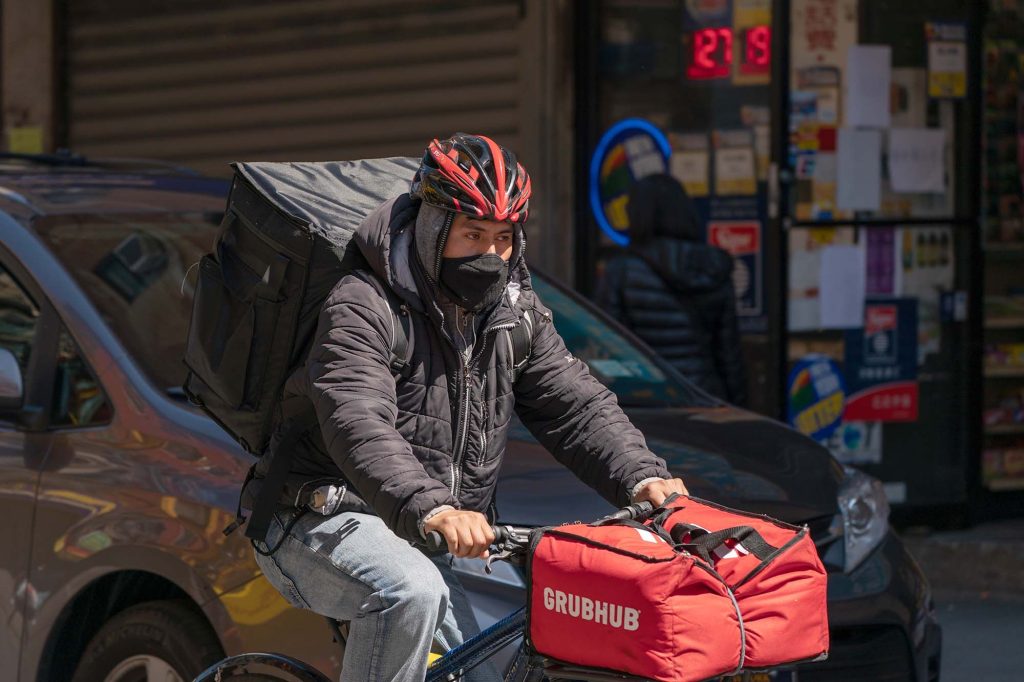 delivery worker on bike