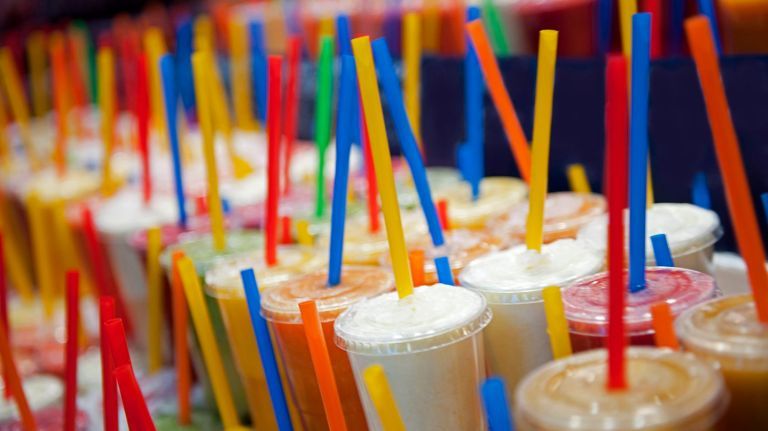 plastic cups with plastic straws