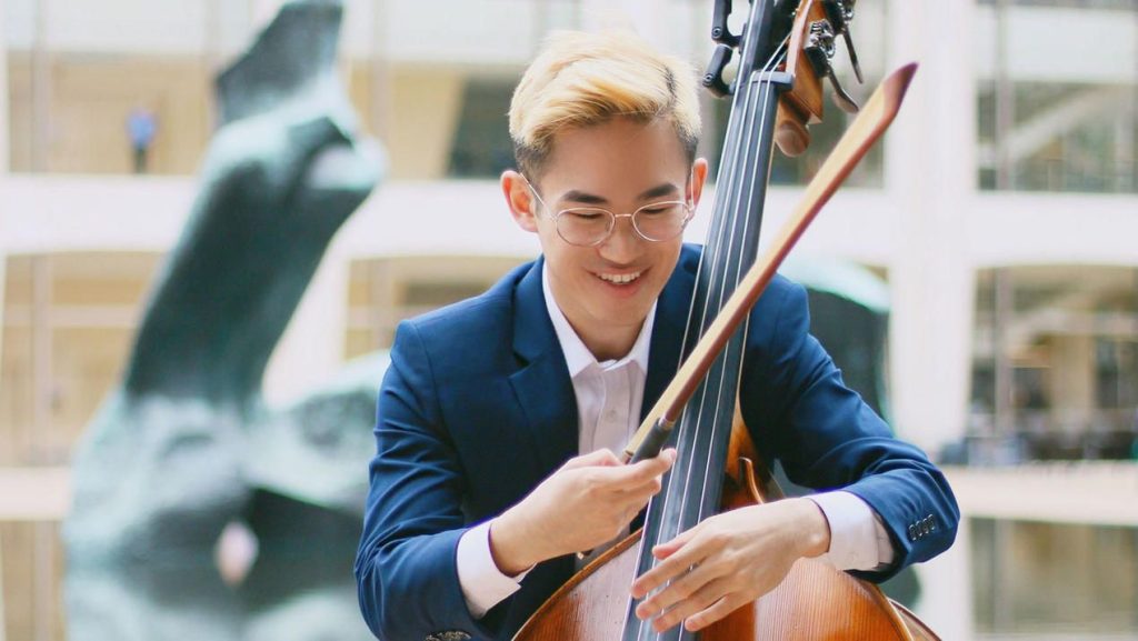 someone playing the cello