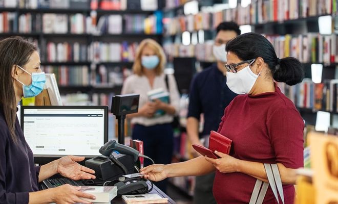 woman shopping with a mask on