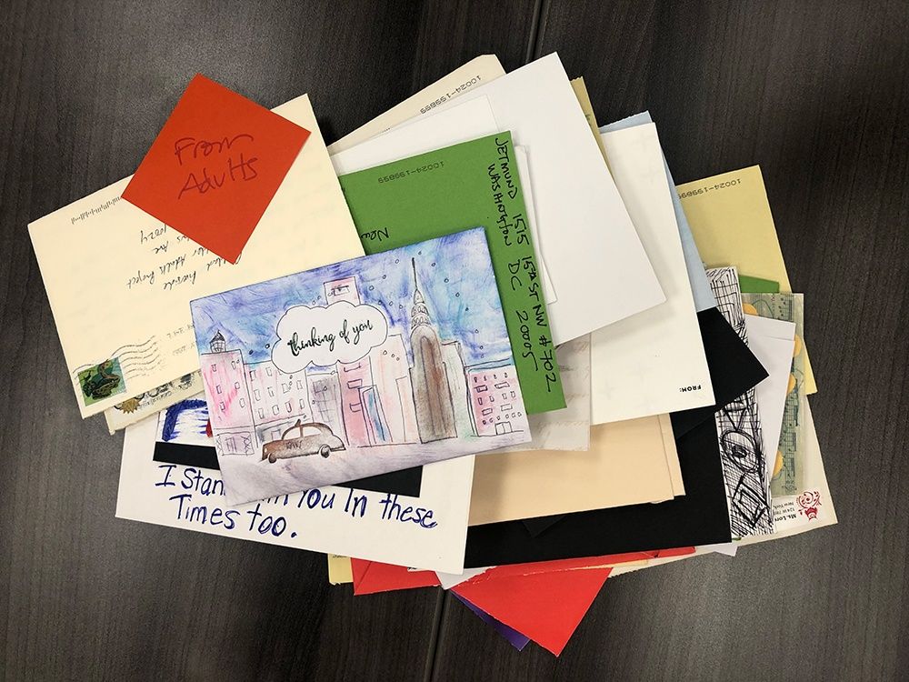 letters sent to Goddard Riverside for older adults to receive spread across a desk