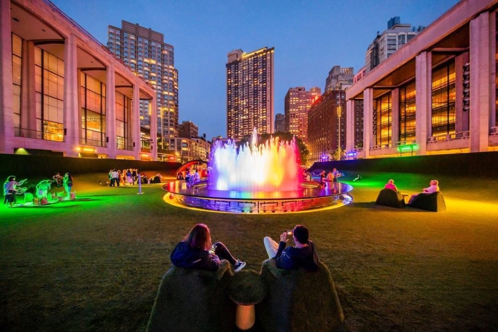 Lincoln Center's fountain lit up in rainbow lights for Pride Month