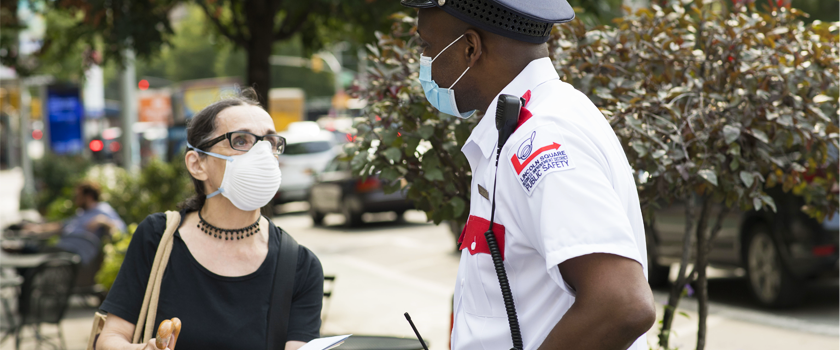 LSBID public safety officer helping a pedestrian