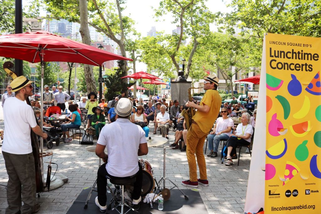 A band plays in Richard Tucker Park during the summer concert series