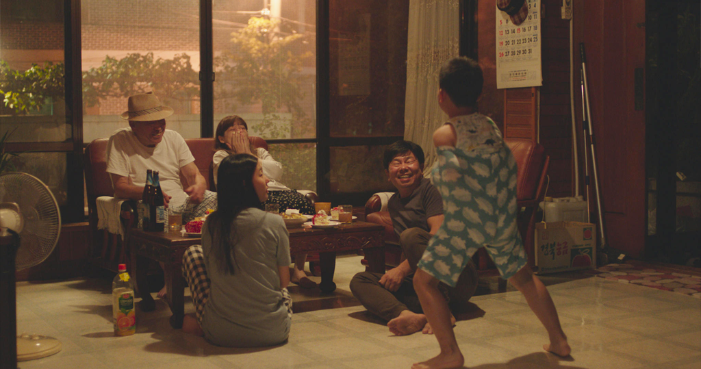screencap of a family from "Moving On"