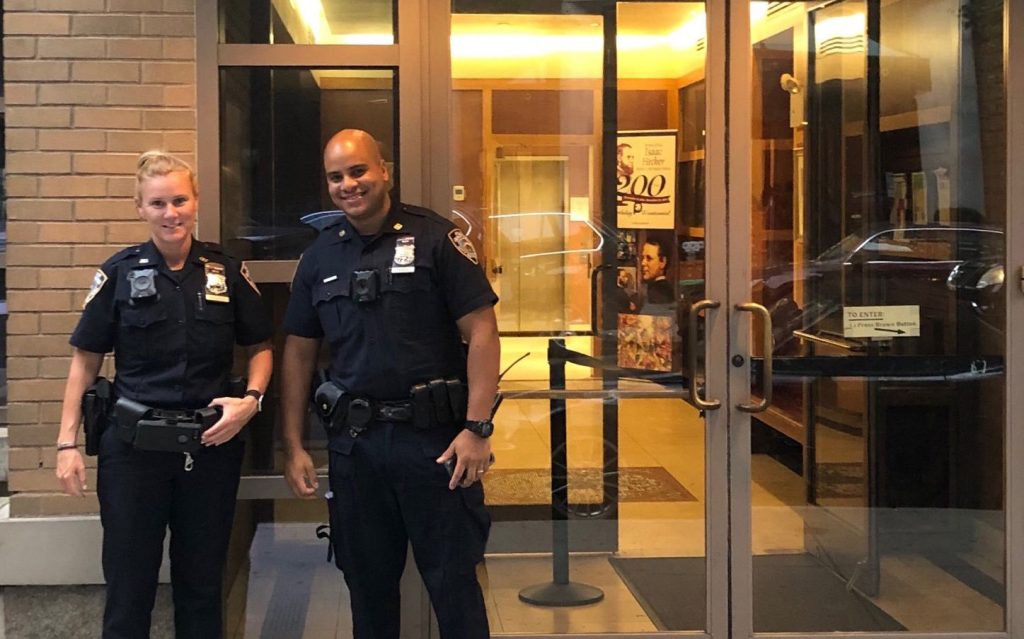 Neighborhood Coordination Officers Fanning and Vasquez pose in uniform
