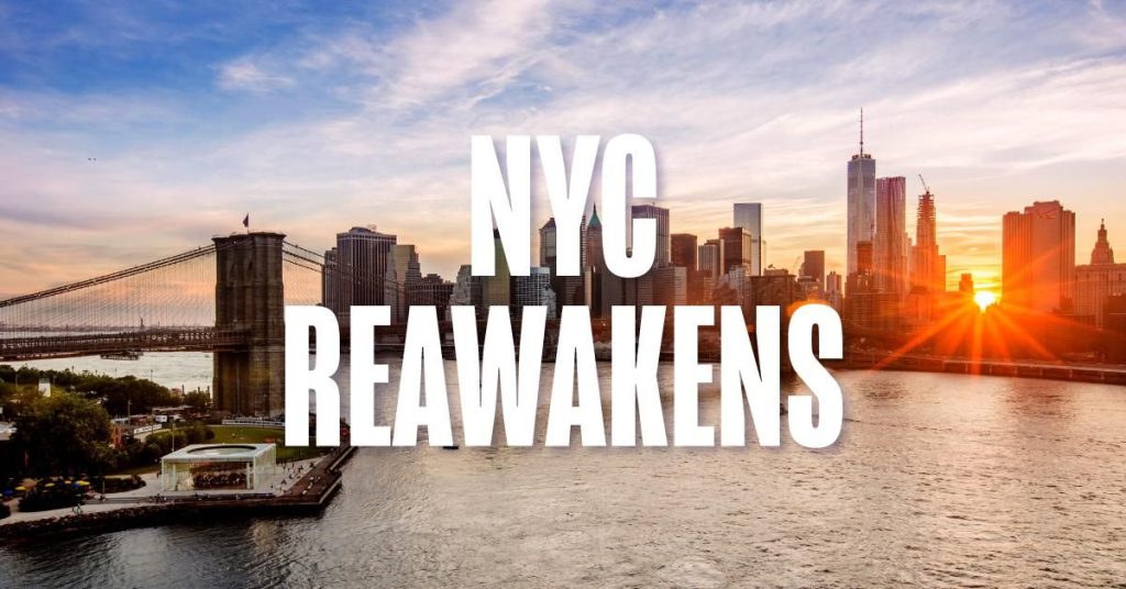 new york city skyline with "nyc awakens" on it