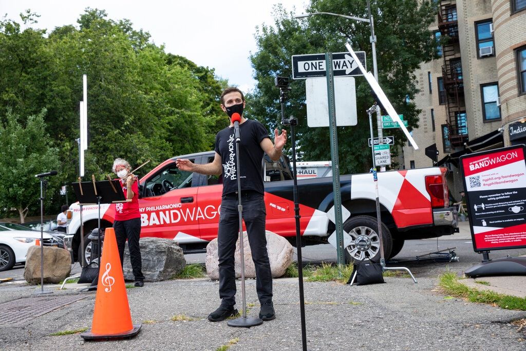 musicians from the ny philharmonic performing on the street