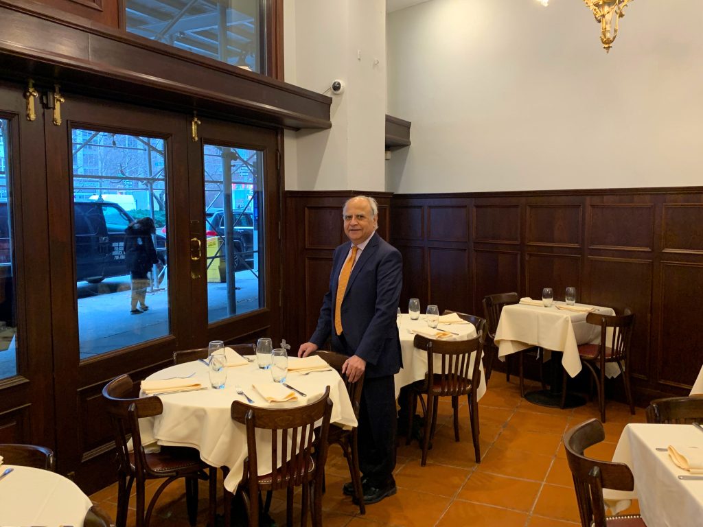 Host Satish Arora poses in the restaurants new dining area
