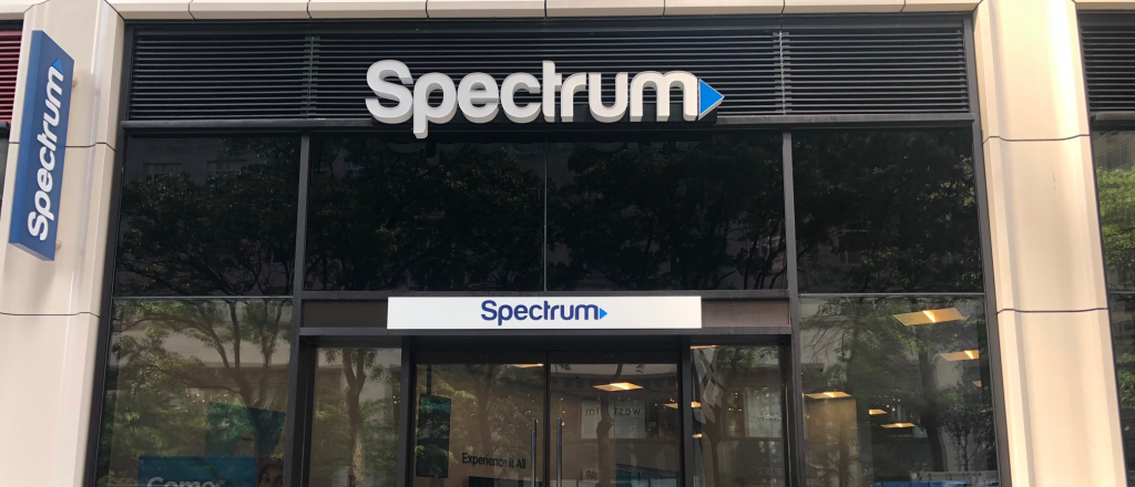 the outside of Spectrum with signage on Broadway at 61st Street