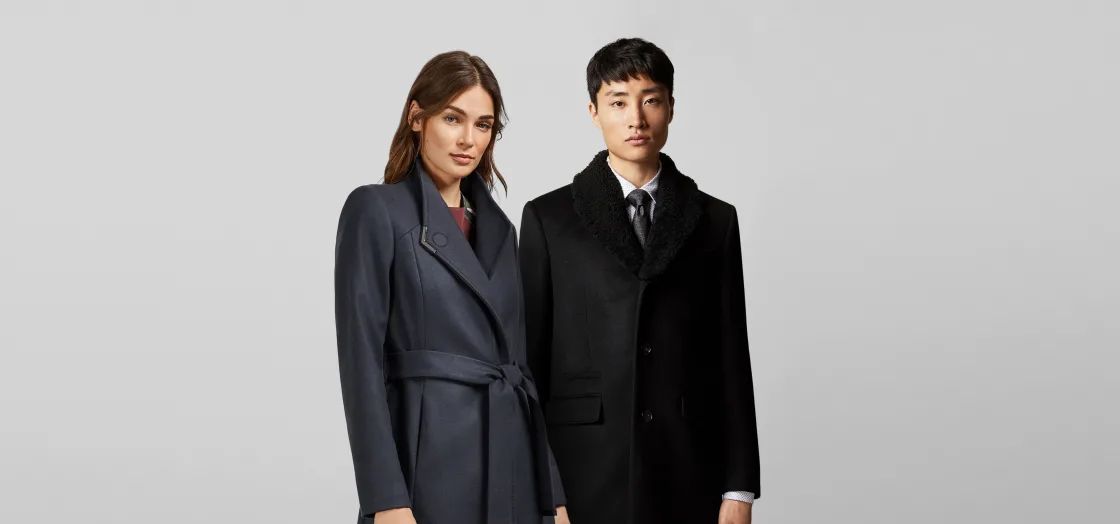 two models in Ted Baker winter peacoats