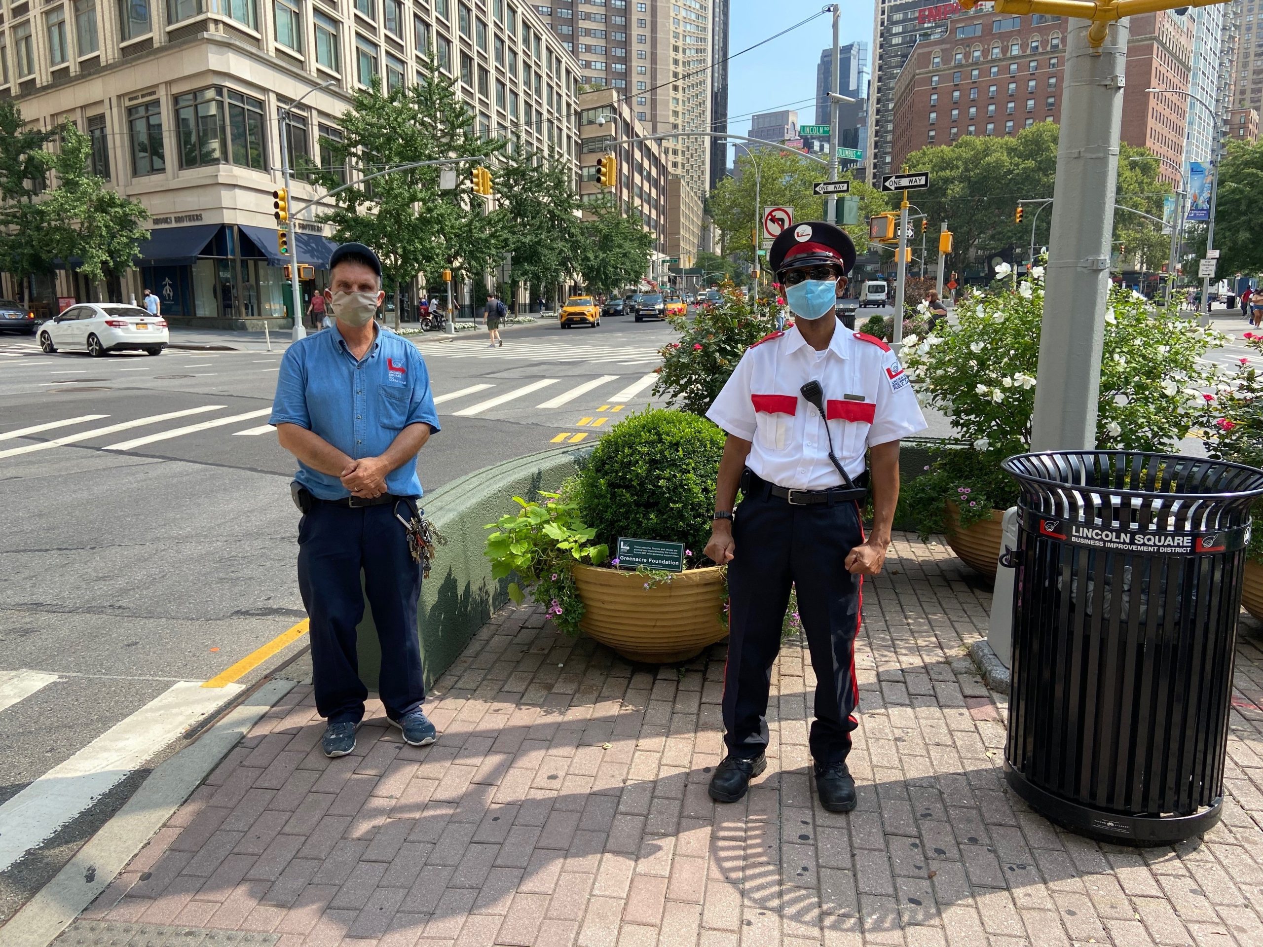 clean team supervisor tony and public safety officer lincoln standing near each other