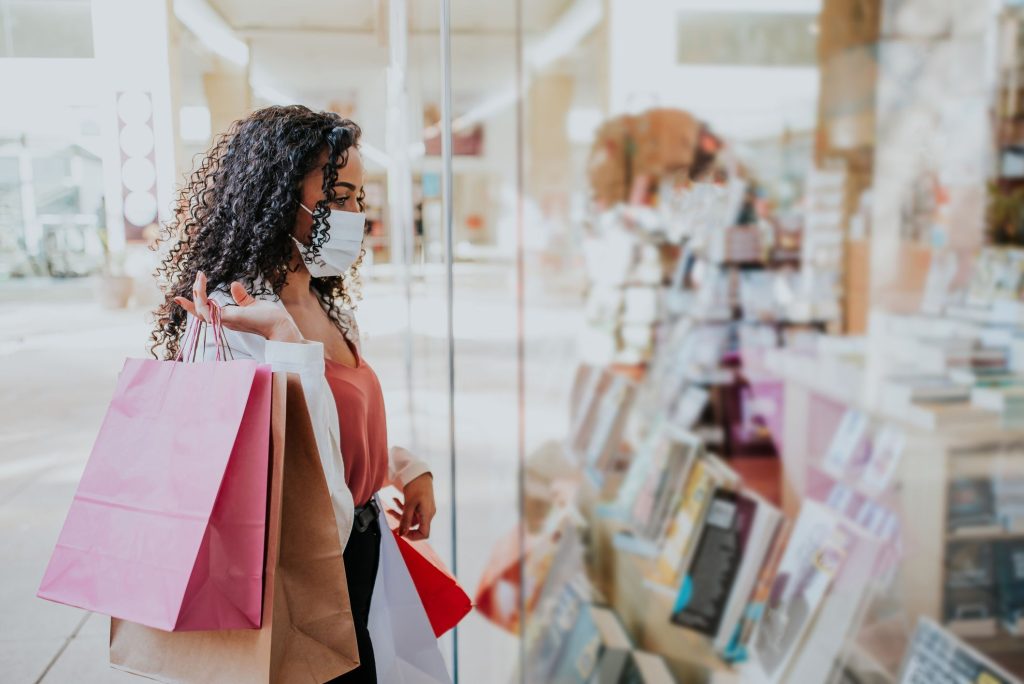 woman shopping with a mask on