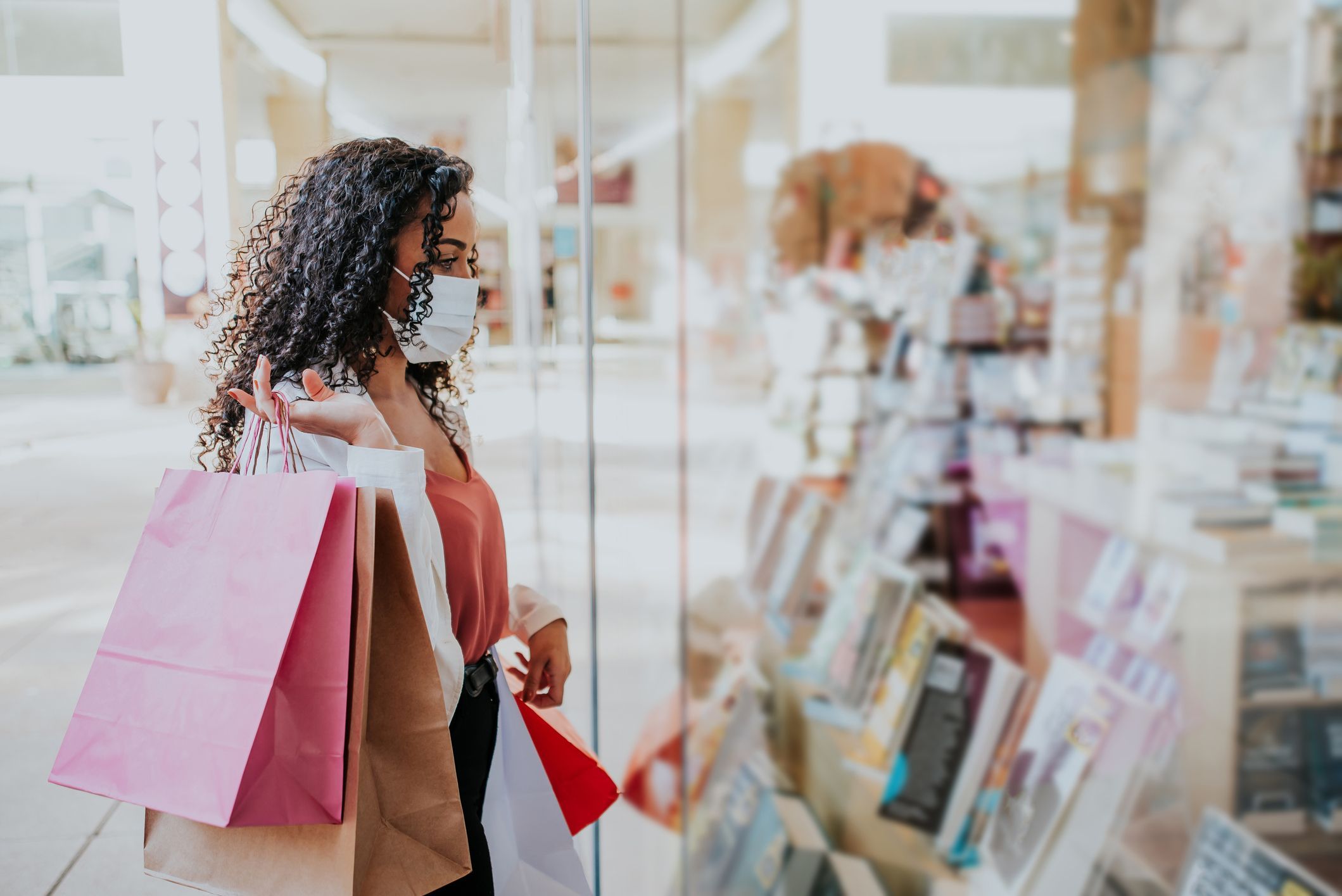 woman shopping with a mask on