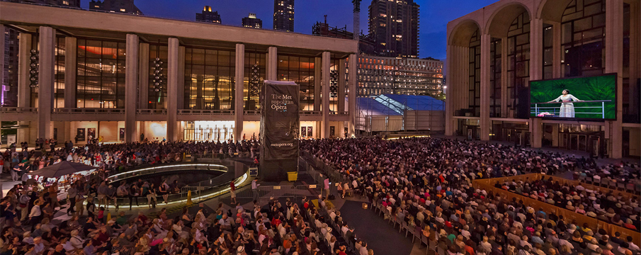 Aerial photo of a crowd watching an outdoor movie in the Plaza at Lincoln Center