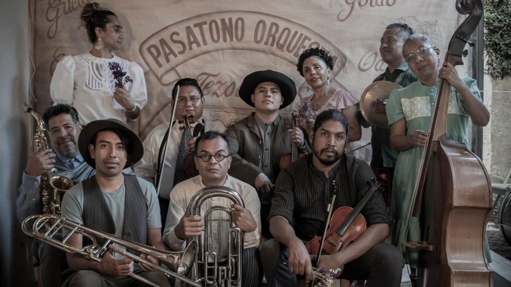 Photo of a band holding their instruments
