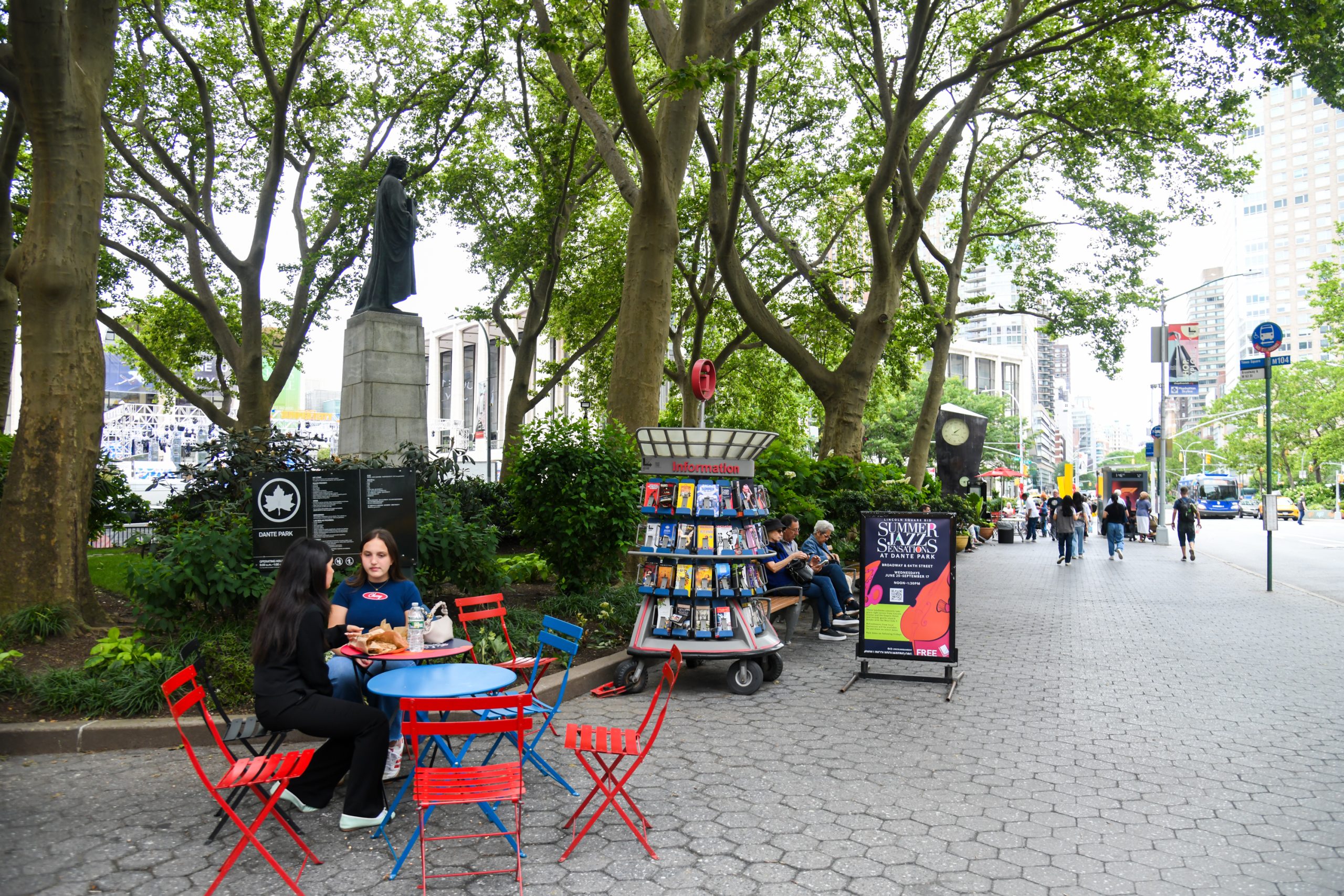 Info cart and furniture in Dante Park