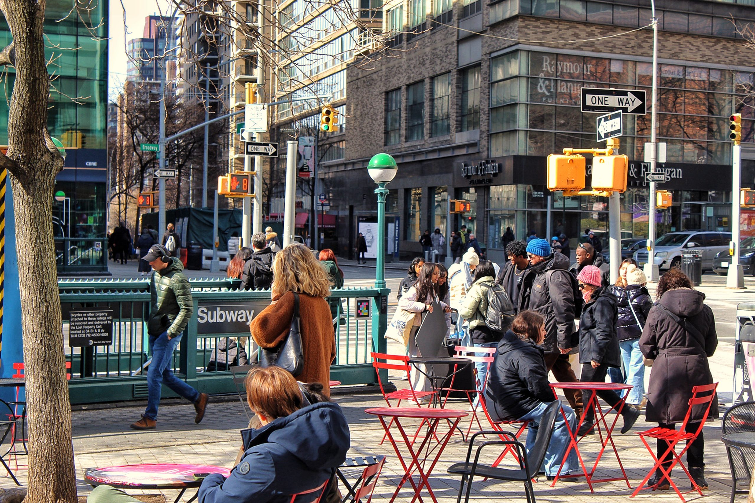 People passing through Richard Tucker Park