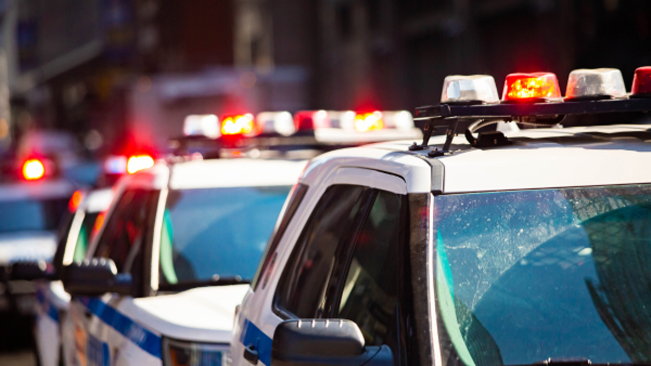 Police cars with sirens